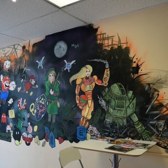 1Up Repairs - Mural depicting video games through the ages on the wall - Mobile Phone Repair Near Me - Austin, Texas 1Up Repairs - Mural depicting video games through the ages on the wall - Mobile Phone Repair Near Me - Austin, Texas