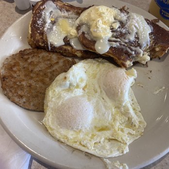 Ronnie's Restaurant - Cinnamon bun French toast with eggs and sausage. - Breakfast & Brunch Near Me - Lenexa, Kansas Ronnie's Restaurant - Cinnamon bun French toast with eggs and sausage. - Breakfast & Brunch Near Me - Lenexa, Kansas