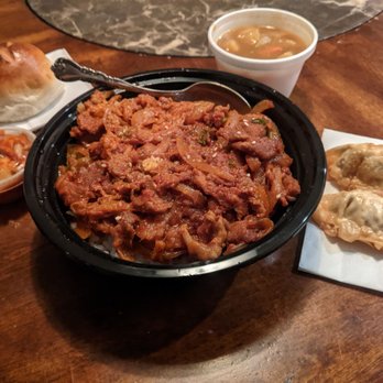 Chef's Kitchen To-Go - Spicy Pork Bowl with dumplings and kimchi, a side of curry vegetables, and a soft bread roll - Korean Near Me - Moreno Valley, California Chef's Kitchen To-Go - Spicy Pork Bowl with dumplings and kimchi, a side of curry vegetables, and a soft bread roll - Korean Near Me - Moreno Valley, California