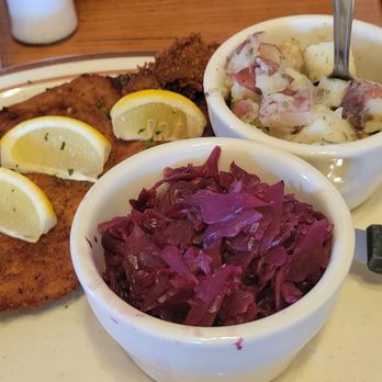 Altdorf Biergarten - Wiener schnitzel, red cabbage, and potato salad - German Near Me - Fredericksburg, Texas Altdorf Biergarten - Wiener schnitzel, red cabbage, and potato salad - German Near Me - Fredericksburg, Texas
