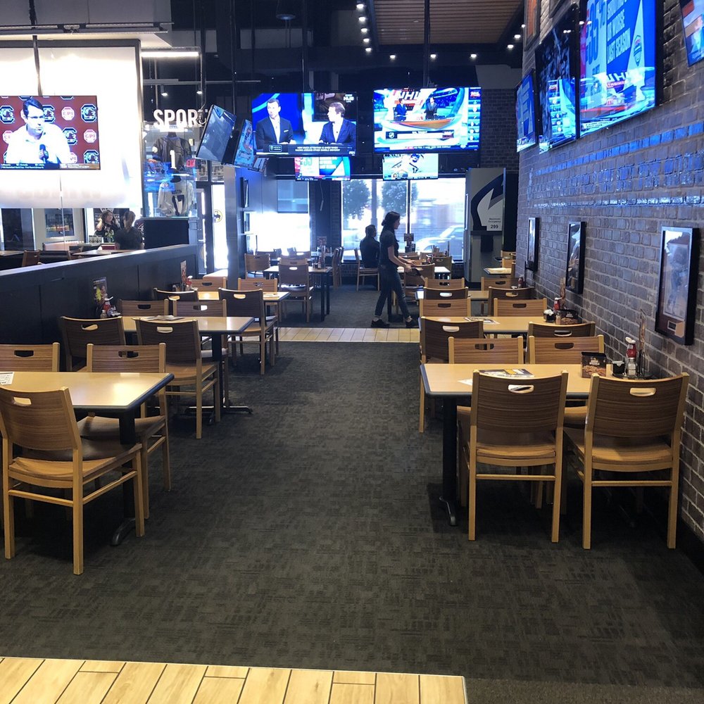Buffalo Wild Wings - Empty floor. So why am I seated next to a full table and trash? - Chicken Wings Near Me - Aurora, Colorado Buffalo Wild Wings - Empty floor. So why am I seated next to a full table and trash? - Chicken Wings Near Me - Aurora, Colorado
