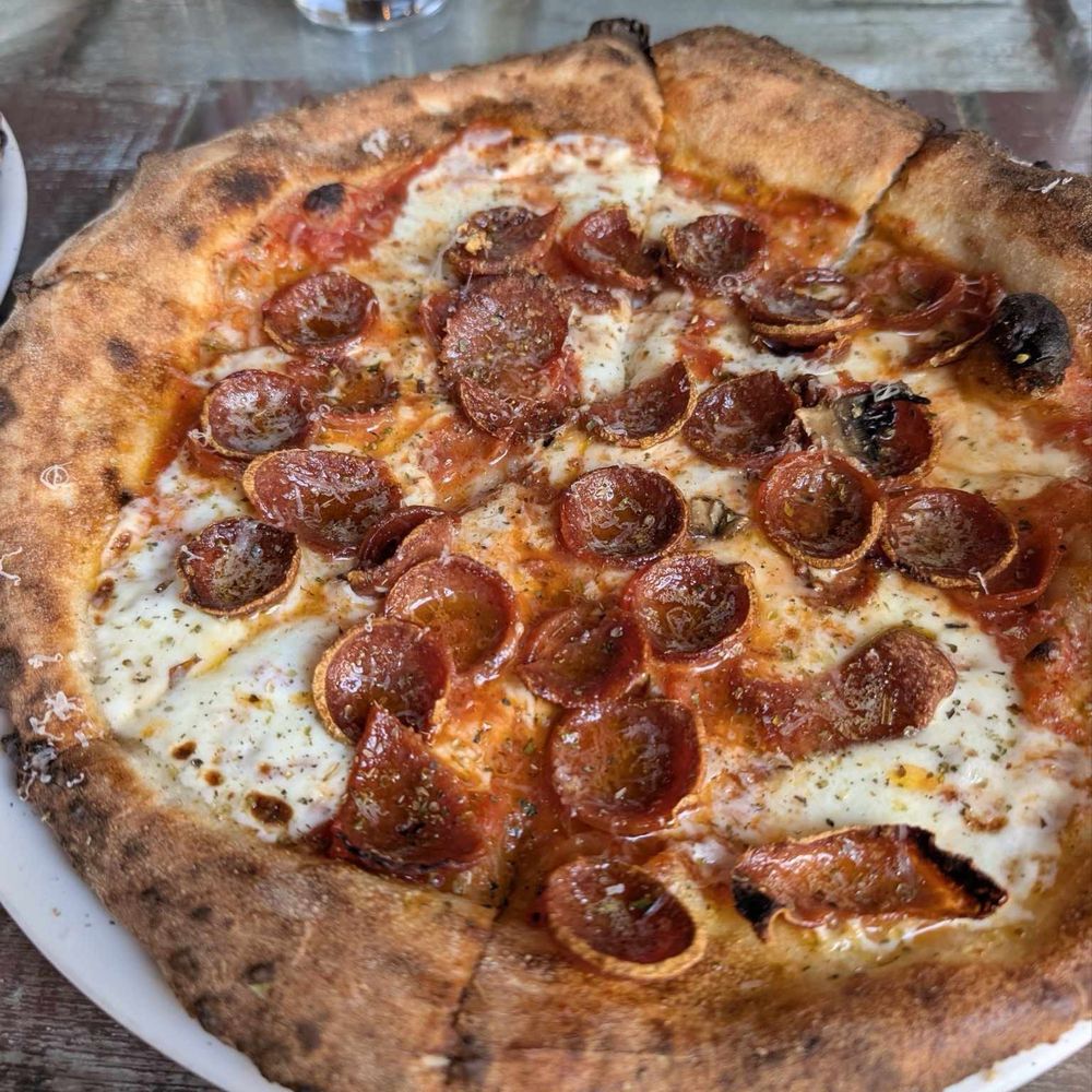 Cafe Reyes - Bodega with pepperoni - Pizza Near Me - Point Reyes Station, California Cafe Reyes - Bodega with pepperoni - Pizza Near Me - Point Reyes Station, California