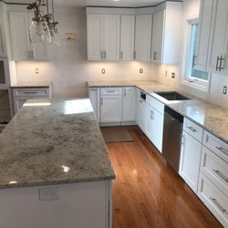 Colonial White granite kitchen countertops with white cabinets was instaslled in Ellicot city, Maryland. Call today Carlos 240 -330-9008