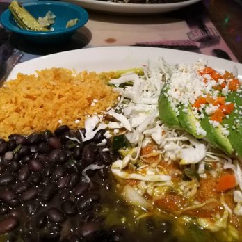 Polvos South - Poblano enchiladas with caliente salsa are amazing - Mexican Near Me - Austin, Texas Polvos South - Poblano enchiladas with caliente salsa are amazing - Mexican Near Me - Austin, Texas