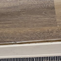 Lack of quarter round at heating vents where there was before the job