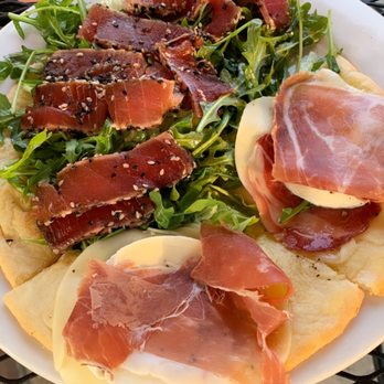 Caffe Positano - Raw tuna and arugula gluten free pizza Prosciutto & Homemade Mozzarella gluten free pizza - Italian Near Me - Apopka, Florida