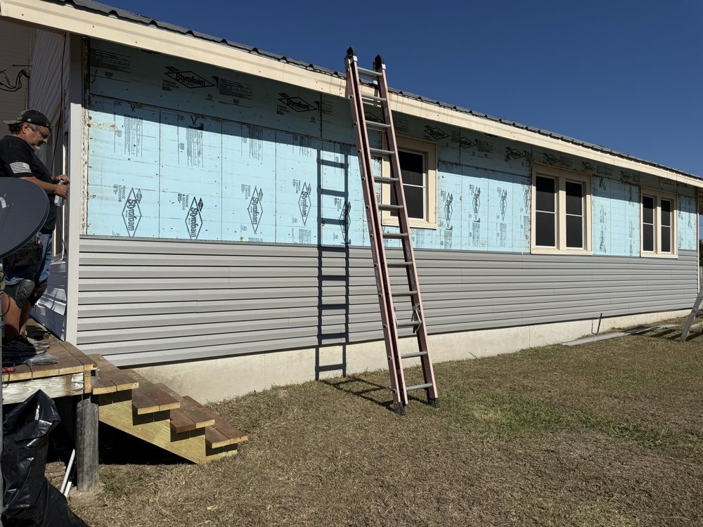 Slide of Mike and Mike Roofing