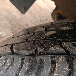 Synergy Cooperative Colfax Tire & Auto Center - Close look at the ruined tires, the inside of the tire is egg shaped and super chopped
