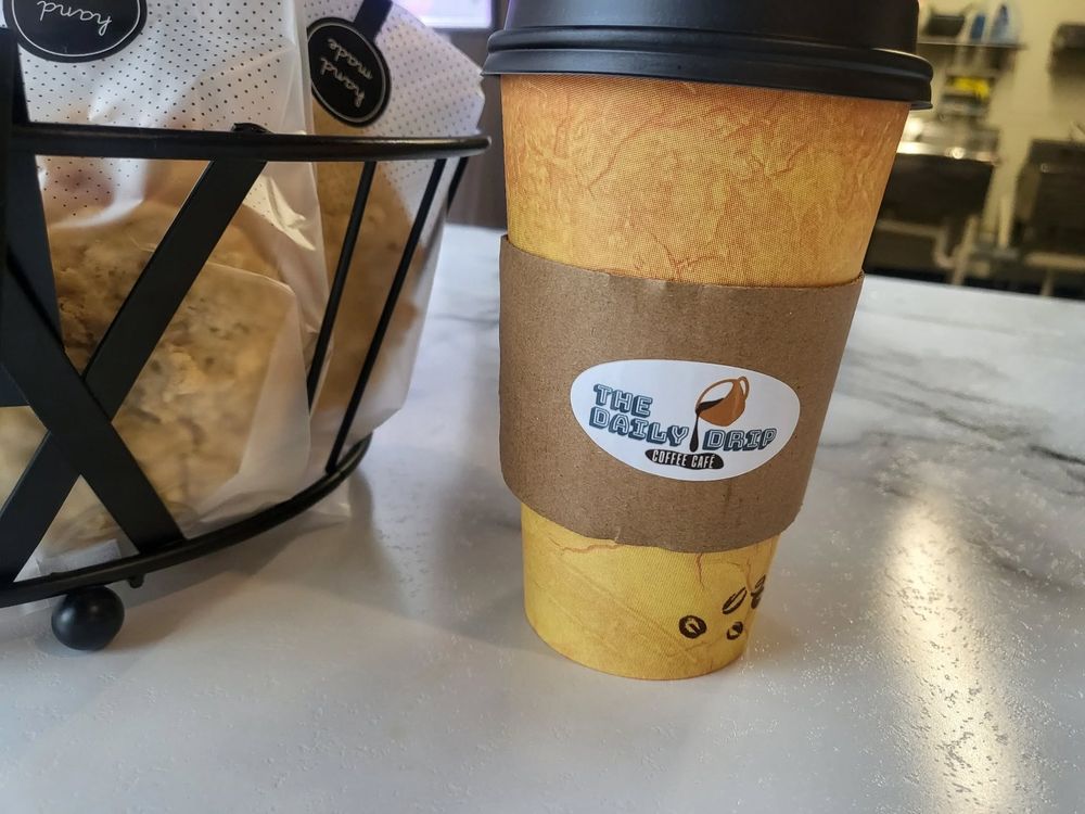 The Daily Drip Coffee Cafe Logo