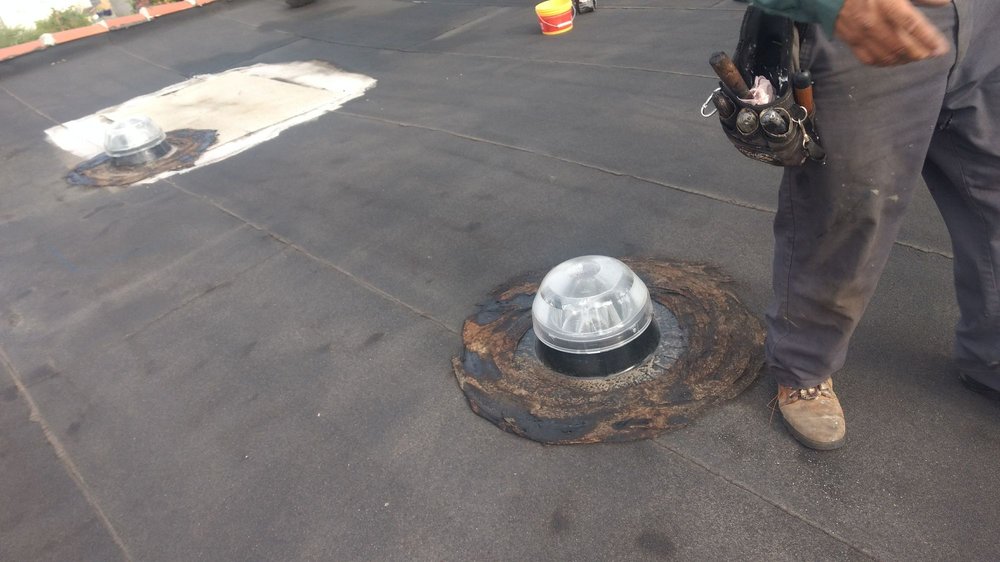 Slide of Benitez Roofing & Waterproofing