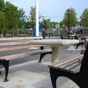 Bloomingdale Park - The Bloomingdale Park playground can be seen in the background. The foreground shows chess/checkers tables. (06/15/05) - Parks Near Me - Staten Island, New York Bloomingdale Park - The Bloomingdale Park playground can be seen in the background. The foreground shows chess/checkers tables. (06/15/05) - Parks Near Me - Staten Island, New York