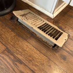 Vanwaw Corporate Rentals - Filthy kitchen floor and broken vent.
