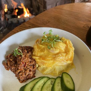Tanzie's - NAM PRIK ONG Ground pork cooked in tomato and red curry paste, served with fresh cucumber - Salad Near Me - Berkeley, California Tanzie's - NAM PRIK ONG Ground pork cooked in tomato and red curry paste, served with fresh cucumber - Salad Near Me - Berkeley, California