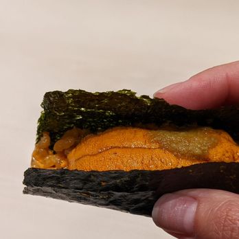 Kogane - Uni hand roll - rice seasoned with 5yo soy sauce, mixed with uni, then placed on the crispiest seaweed paper and more uni piled on top - Sushi Bars Near Me - Alhambra, California