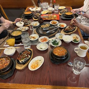 Seoul Garden Restaurant - Table with all our sides and meals - Korean Near Me - Houston, Texas Seoul Garden Restaurant - Table with all our sides and meals - Korean Near Me - Houston, Texas