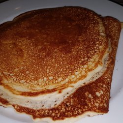 Crazy Eggs - Two big pancakes on a separate plate.