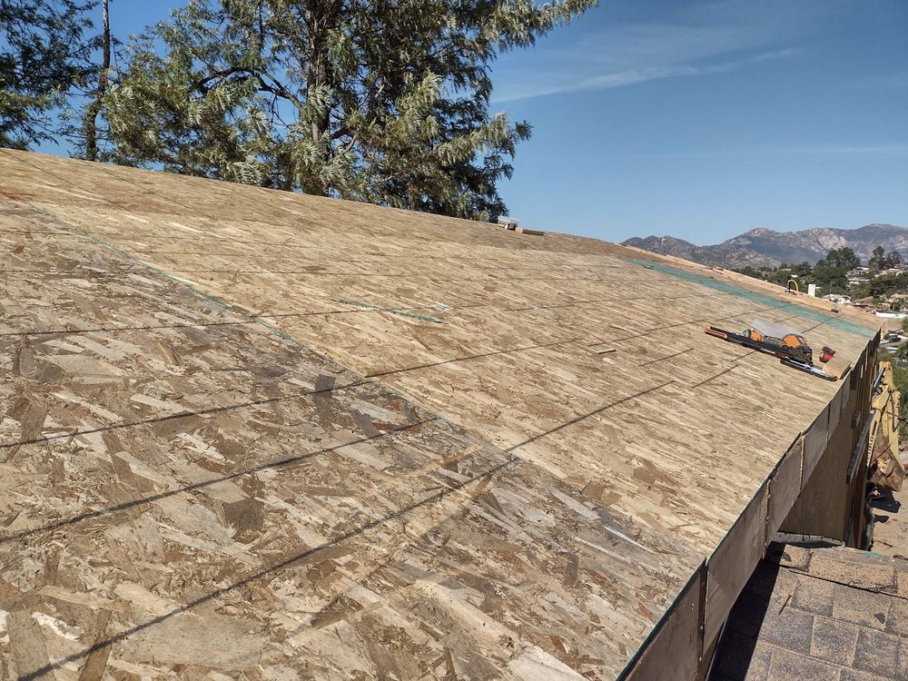 Slide of Mendez roofing