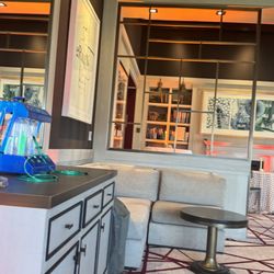 Alpine Oxygen - Alpine Oxygen bar station set up near a restaurant or event counter, ready to provide oxygen services for guests and visitors.