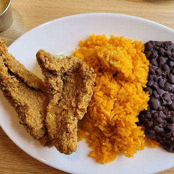 Brasa Rotisserie - Fried catfish plate with rice and beans. - Southern Near Me - Minneapolis, Minnesota Brasa Rotisserie - Fried catfish plate with rice and beans. - Southern Near Me - Minneapolis, Minnesota