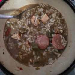 7Spice - Gumbo with two sausage slices and 3.5 chunks of chicken in a medium sized serving.