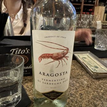 Cantina Italiana - The white wine I enjoyed and amazing bartender in background. - Italian Near Me - Boston, Massachusetts Cantina Italiana - The white wine I enjoyed and amazing bartender in background. - Italian Near Me - Boston, Massachusetts