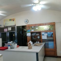 Famosa Bakery - Check-out Counter/Back of the Bakery