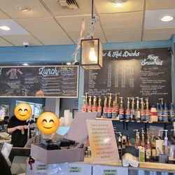 Cups Espresso & Cafe - Front entrance and menu