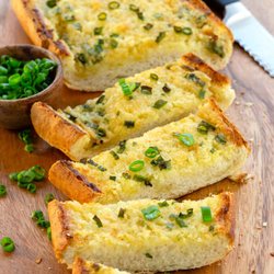Space City Pizza - Indulge in the irresistible aroma and flavor of our warm garlic bread. Perfectly baked and served fresh, our garlic bread is the perfect com