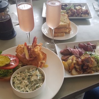 The Strand - Buttermilk Chicken Sandwich / Steak and Eggs / Watermelon Mimosa - New American Near Me - Orlando, Florida