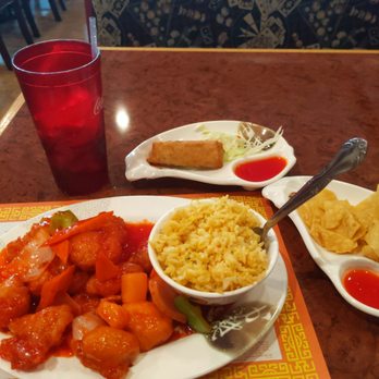Grand China - I got the sweet and sour chicken, it came with the sour and spicy soup, a crab rangoon, rice, an egg roll, and some chips. - Chinese Near Me - Henderson, Nevada