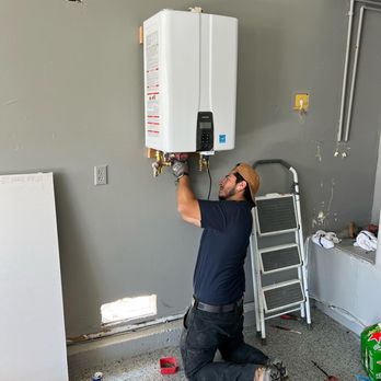 Almighty Plumbing - Javier working on a nee Navien Tankless Water Heater Installation in Antioch, CA - Plumbing Near Me - Antioch, California Almighty Plumbing - Javier working on a nee Navien Tankless Water Heater Installation in Antioch, CA - Plumbing Near Me - Antioch, California