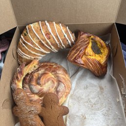 Stollen, Bourbon Coffee roll, sweet potato pesto danish, and gingerbread cookies! Sorry, the cinnamon roll had already been devoured. Stollen, Bourbon Coffee roll, sweet potato pesto danish, and gingerbread cookies! Sorry, the cinnamon roll had already been devoured.