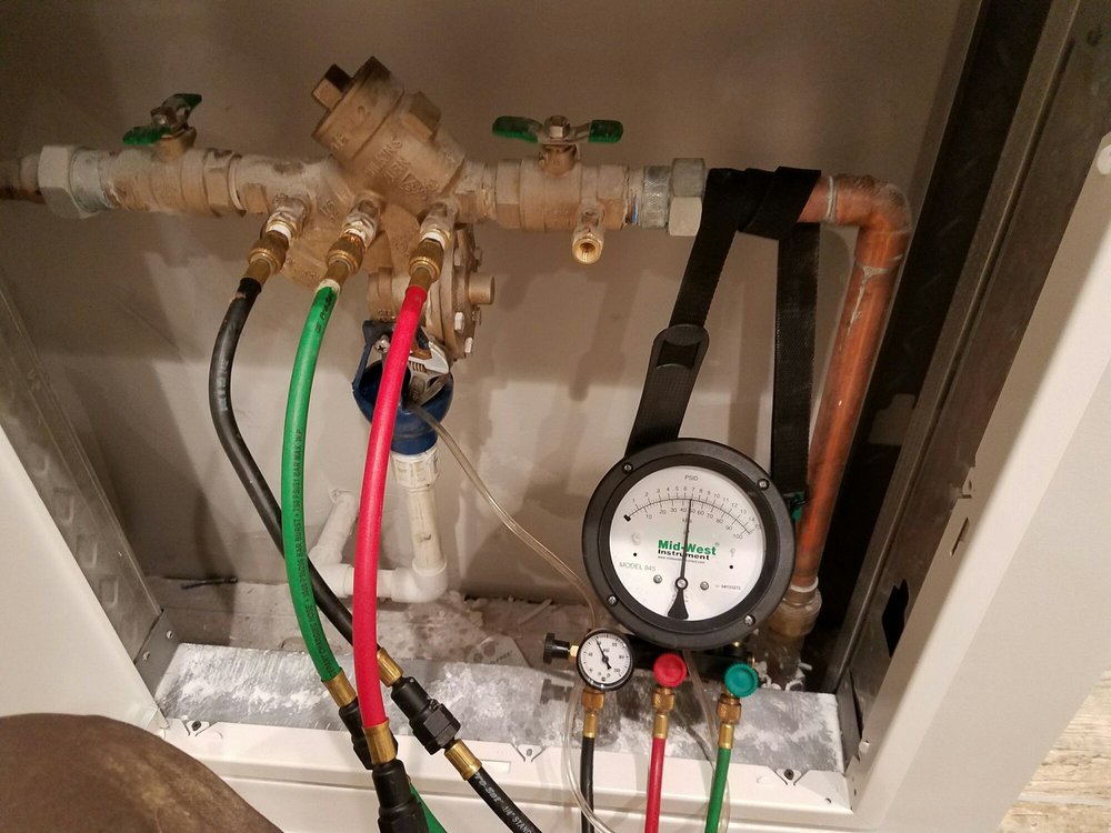 Slide of Root'n Toot'n Drain Cleaning Service