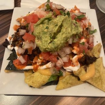 VSPOT - Nachos supreme shared by two and also delicious! - Vegan Near Me - Brooklyn, New York