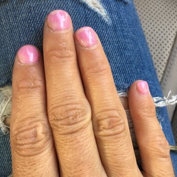 Modern Nails - It was suppose to be a pink color and soon after I left the salon I got 2 different colors. And she is blaming the nail polish company - Nail Salons Near Me - Tampa, Florida