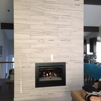 Bromwell's - Custom surround on a glass insert... highly efficient and super slick looking! Client was thrilled with end result! - Fireplace Services Near Me - Falls Church, Virginia