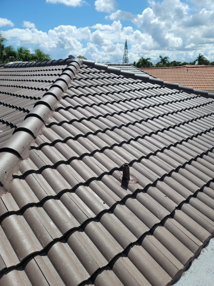 Slide of JMR Roofing Services