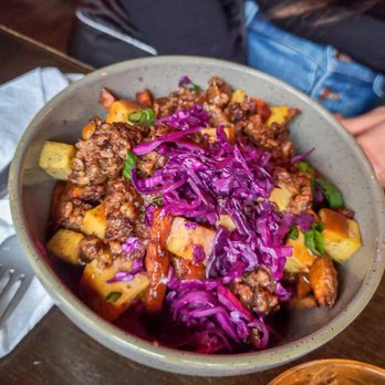 Le Trèfle - a bowl of food on a table - Irish Pub Near Me - Montreal, Quebec
