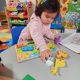 My daughter doing puzzles