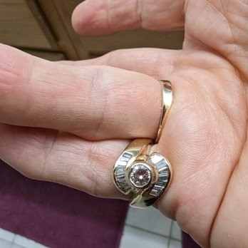 Geneva Jewelry - The bezel has not been fixed and there is no more gold sticking straight up. - Jewelry Near Me - Riverside, California Geneva Jewelry - The bezel has not been fixed and there is no more gold sticking straight up. - Jewelry Near Me - Riverside, California