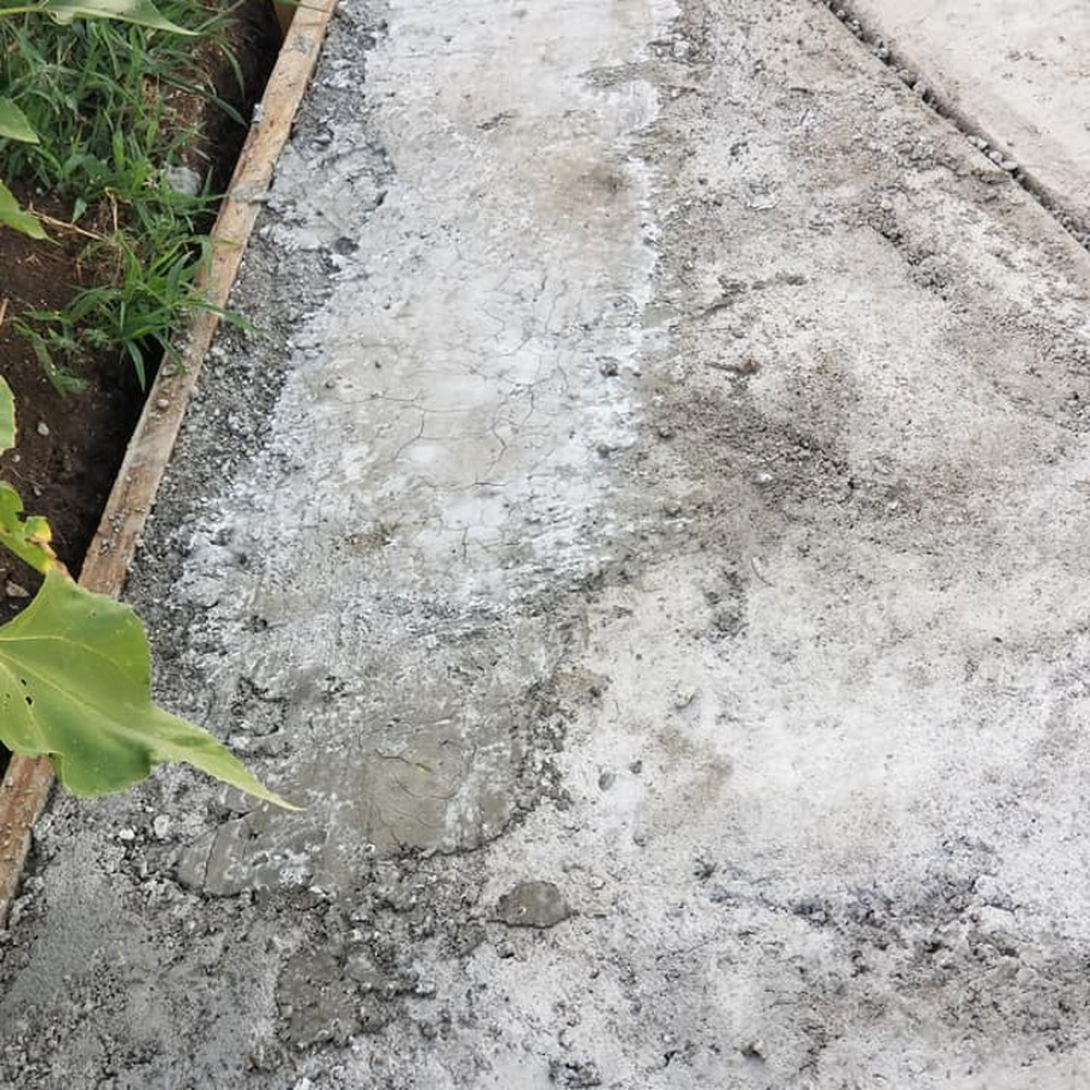 Andrews & Sons Construction - This patch with dry concrete coming up - it's lose. - Masonry/Concrete Near Me