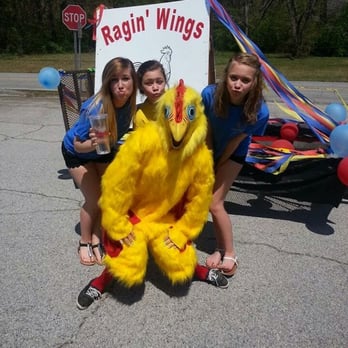 Ragin' Wings - hree girls posing with a stuffed chicken - Chicken Wings Near Me - Bremen, Georgia Ragin' Wings - hree girls posing with a stuffed chicken - Chicken Wings Near Me - Bremen, Georgia