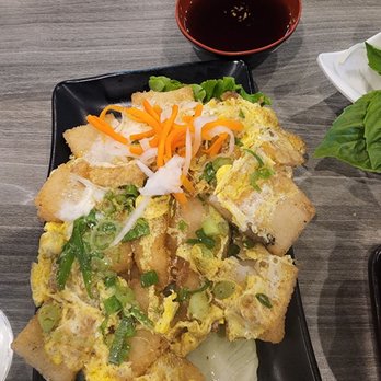 New Super Pho - Daikon fried cakes woth eggs. Soo good as well! Vinegar and soy sauce. - Vietnamese Near Me - Duluth, Georgia New Super Pho - Daikon fried cakes woth eggs. Soo good as well! Vinegar and soy sauce. - Vietnamese Near Me - Duluth, Georgia