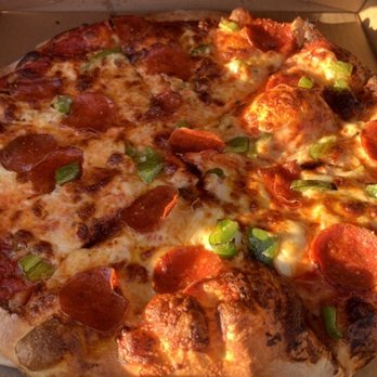 Roman Wheel Pizzeria - Pizza Near Me - Suttons Bay, Michigan