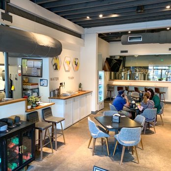 Hop Atomica - Inside seating with open kitchen on left - Breweries Near Me - Savannah, Georgia Hop Atomica - Inside seating with open kitchen on left - Breweries Near Me - Savannah, Georgia