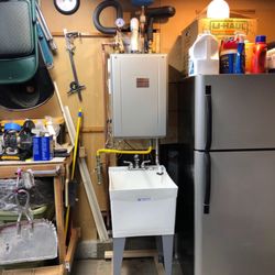 Payless Water Heaters - New Tankless Water Heater it's a Noritz EZTR50 model this was in Irvine. We service all of Orange County.