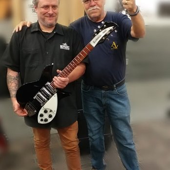 Guitar Center - Allen - Tech guy at Cary, NC GC with my Rickenbacker after he'd re-strung it and fine-tuned some settings.  Thans for the TLC, Allen. - Musical Instruments & Teachers Near Me - Cary, North Carolina