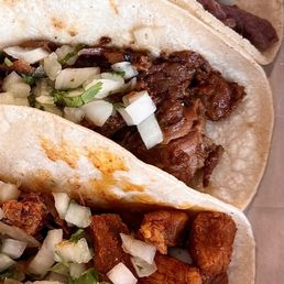 Pork, steak, and chicken tacos. Go with the pork or the chicken. Pork, steak, and chicken tacos. Go with the pork or the chicken.