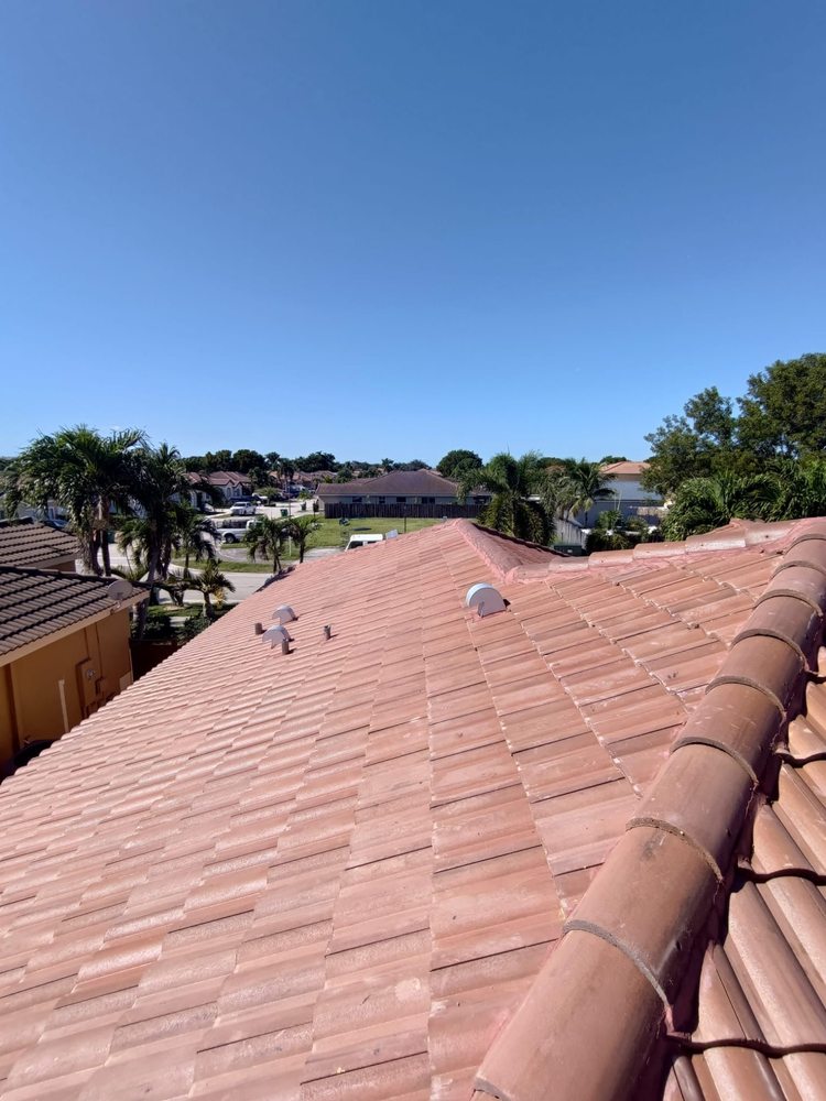 Slide of JMR Roofing Services