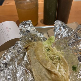 HomeState - My brisket flour tortillas taco, southern ice tea and the two salsa, one is green salsa and the red one is a bit smoky - Mexican Near Me - Santa Monica, California HomeState - My brisket flour tortillas taco, southern ice tea and the two salsa, one is green salsa and the red one is a bit smoky - Mexican Near Me - Santa Monica, California